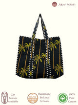 Palms black quilted tote bag