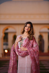 An artistic pink handblock cotton kurta set with Lace detail